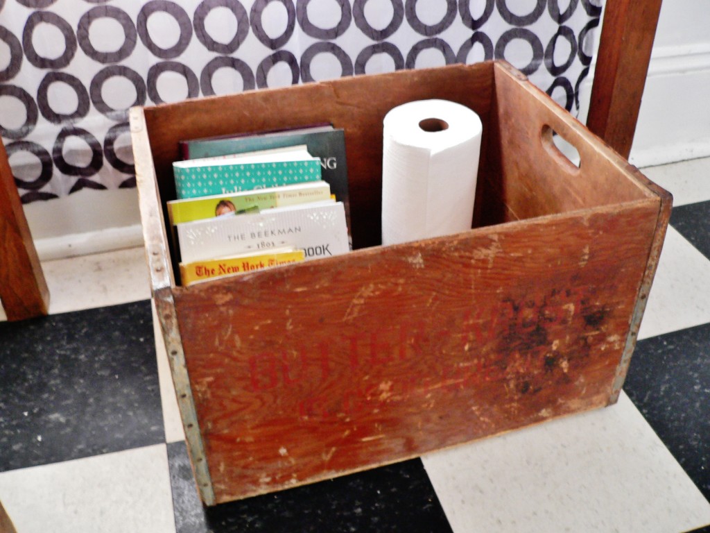 This massive Butter Krust box holds all of our cookbooks and paper towel rolls. 